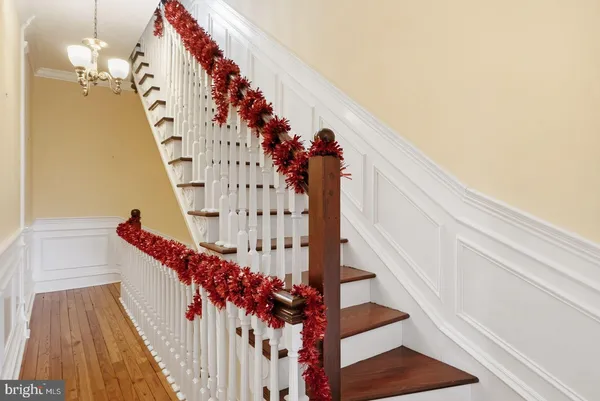 a front view of a house with wooden floor