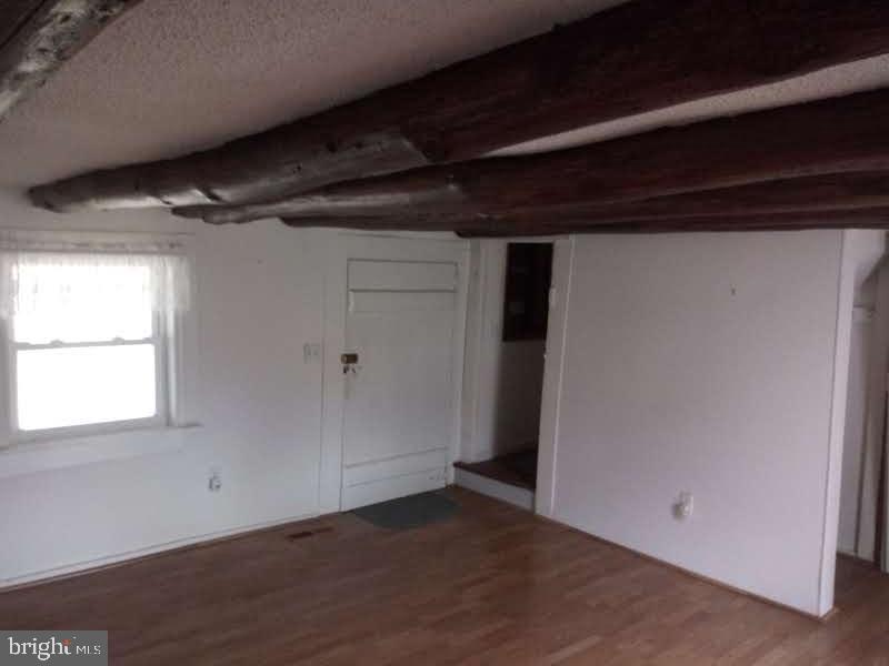 5856 Moore Road Marshall, VA 20115 - Photo 2 of 62 Living room Old front Door and log beams