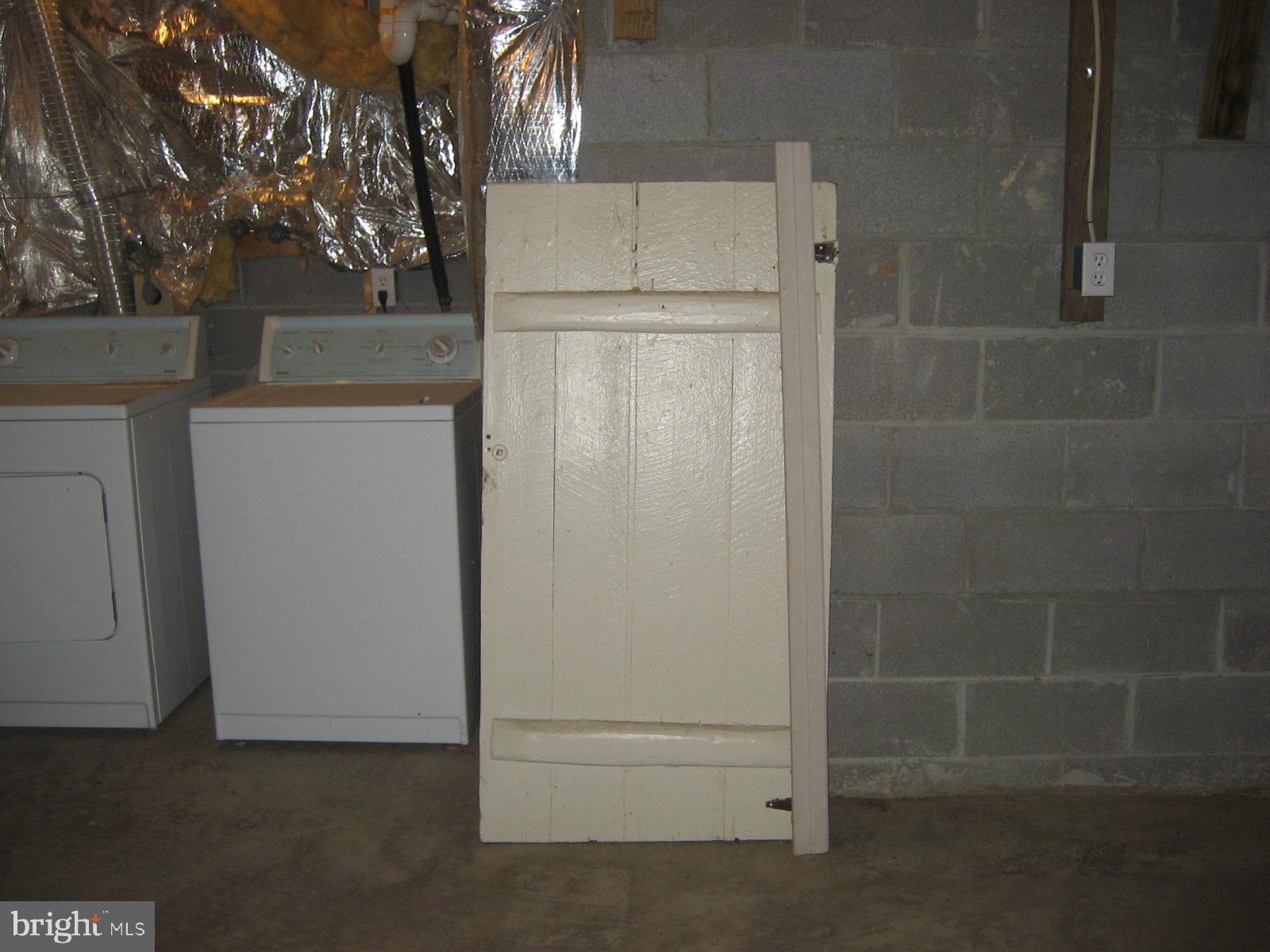 5856 Moore Road Marshall, VA 20115 - Photo 54 of 62 Extra old door stored in basement