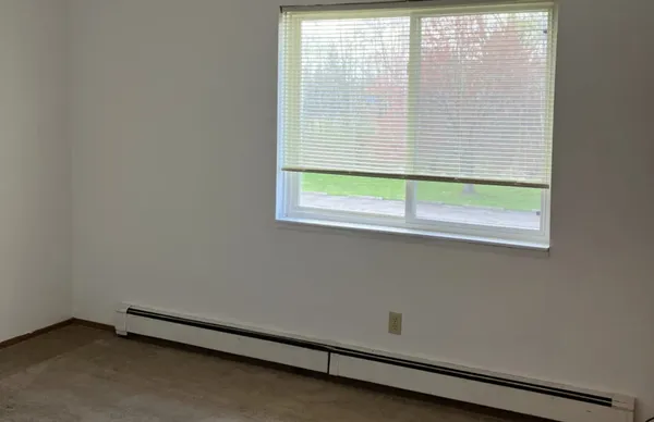 an empty room with a window