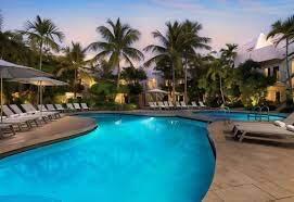 1401 Simonton Street, Unit 11 Key West, FL 33040 - Photo 11 of 17 a swimming pool with outdoor seating and yard