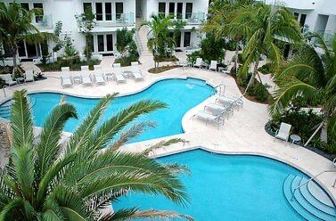 1401 Simonton Street, Unit 11 Key West, FL 33040 - Photo 12 of 17 a view of a swimming pool with a patio