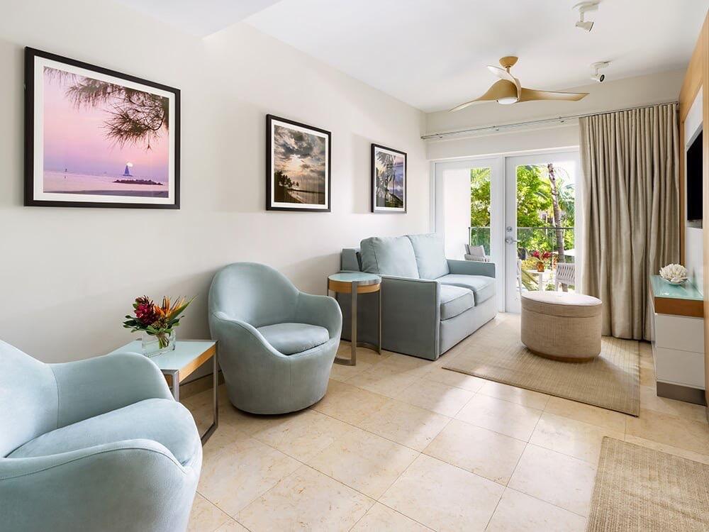 1401 Simonton Street, Unit 11 Key West, FL 33040 - Photo 5 of 17 a living room with furniture and a large window