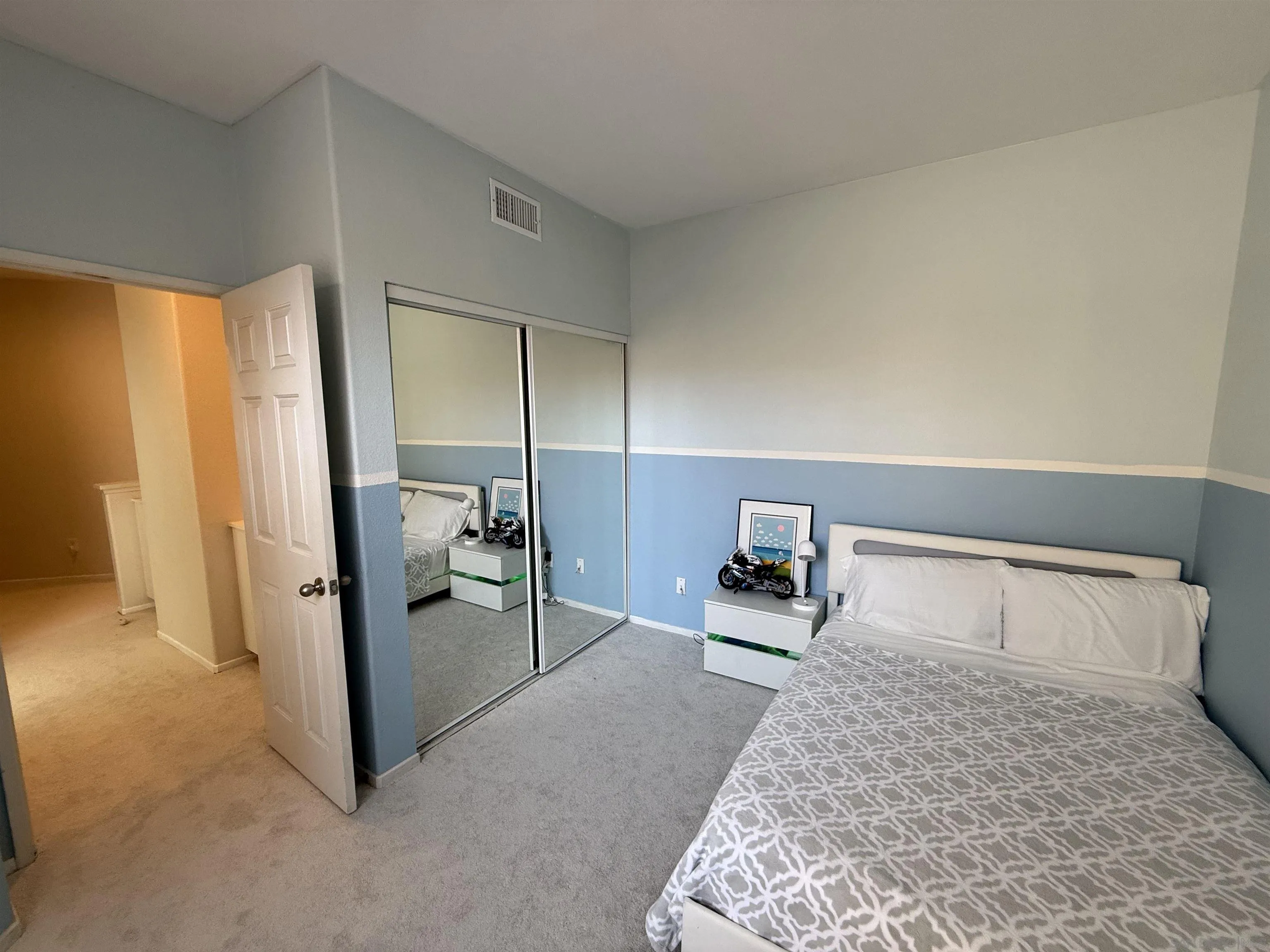 12530 Heatherton Court, Unit 31 San Diego, CA 92128 - Photo 24 of 36 a living room with furniture and a window