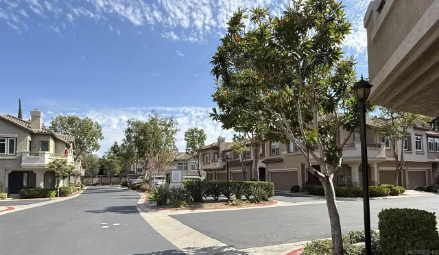 a view of a street with houses