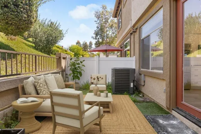 a building outdoor space with patio furniture