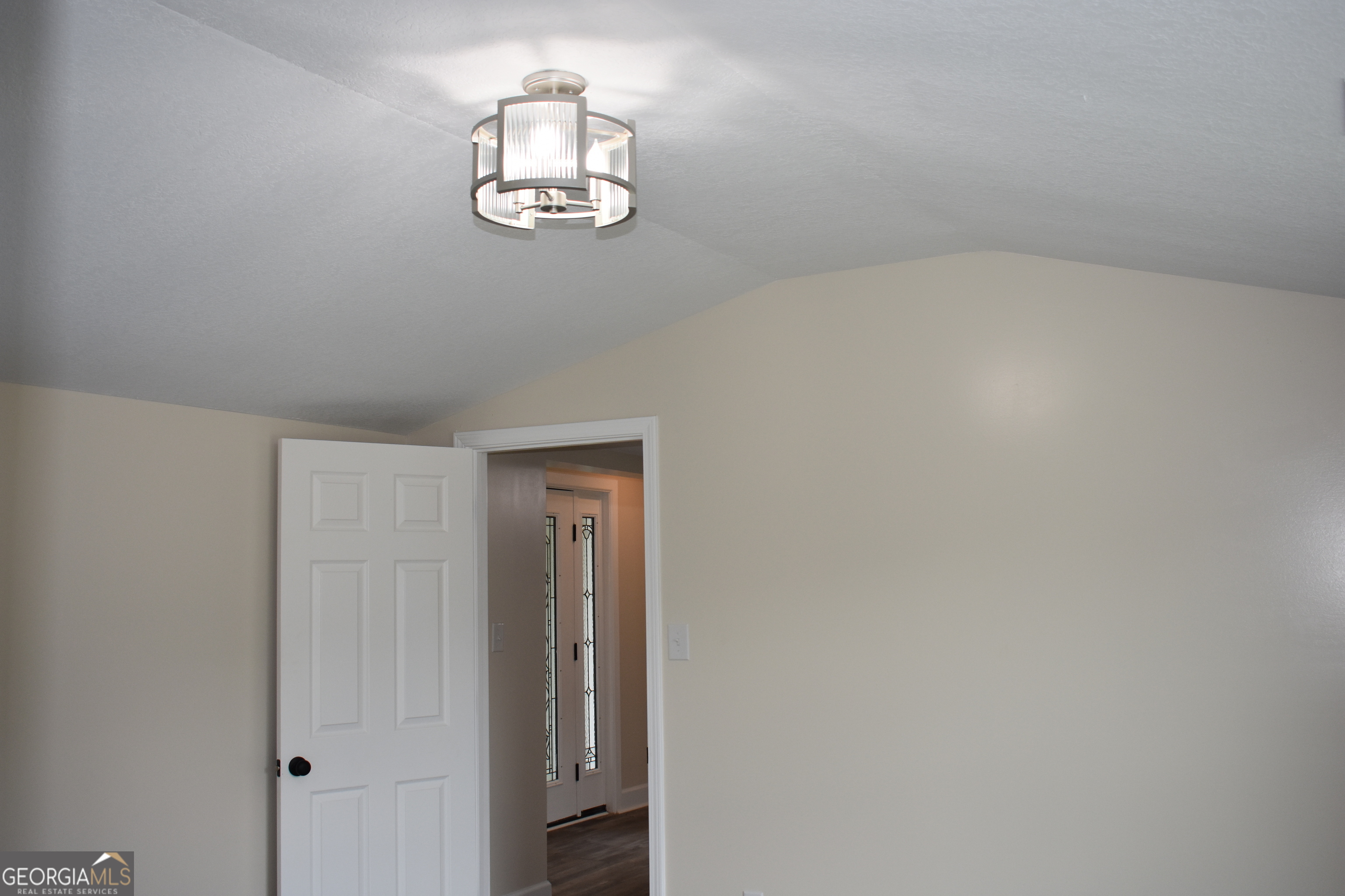 537 Quick Run Road Reidsville, GA 30453 - Photo 19 of 42 a view of a decorative light in a hallway