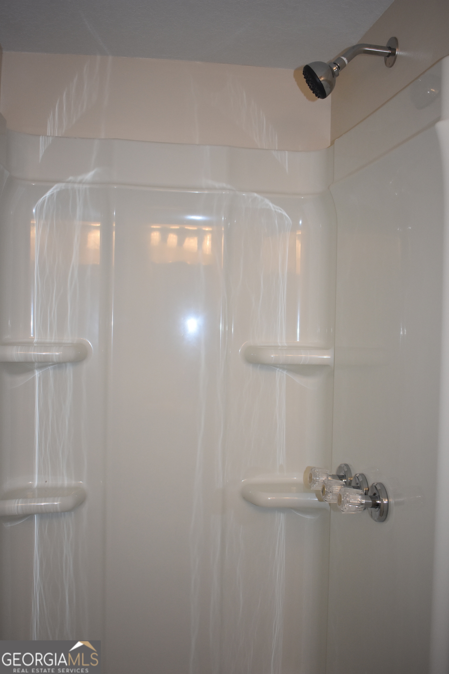 537 Quick Run Road Reidsville, GA 30453 - Photo 21 of 42 a bathroom with a shower