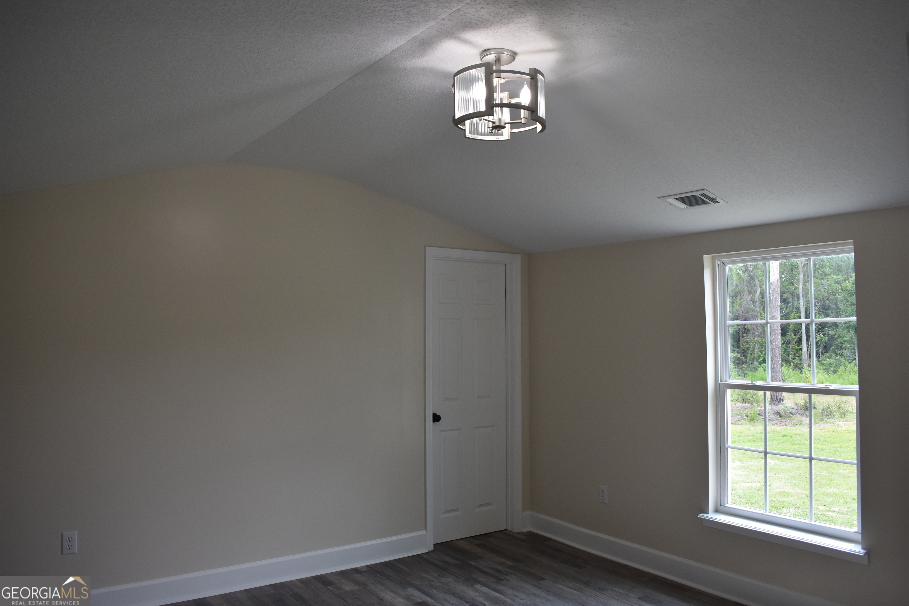 537 Quick Run Road Reidsville, GA 30453 - Photo 36 of 42 a view of a livingroom with a window