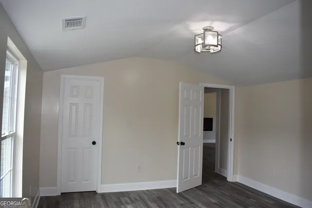 a front view of house with garden