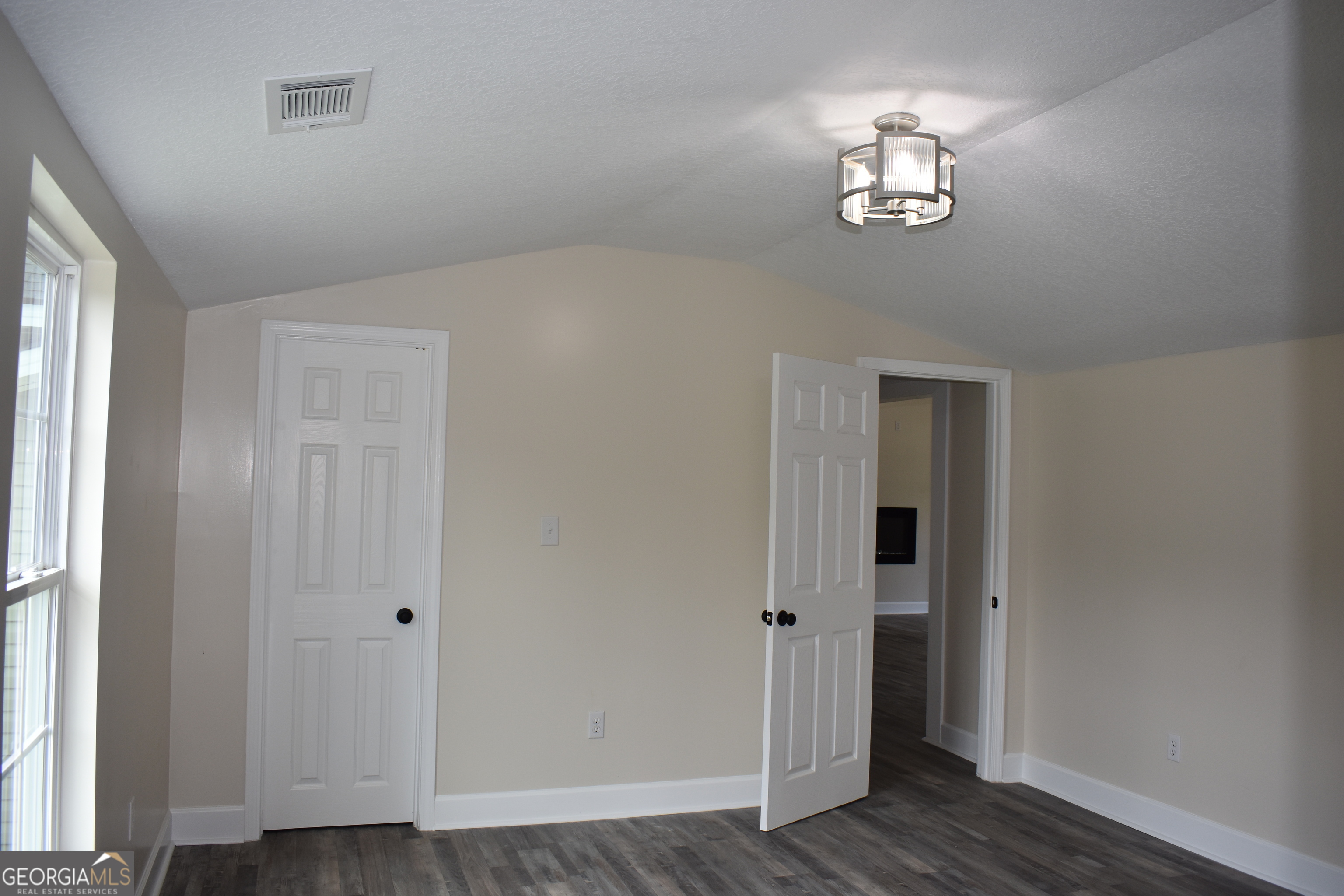 537 Quick Run Road Reidsville, GA 30453 - Photo 39 of 42 a view of empty room with wooden floor