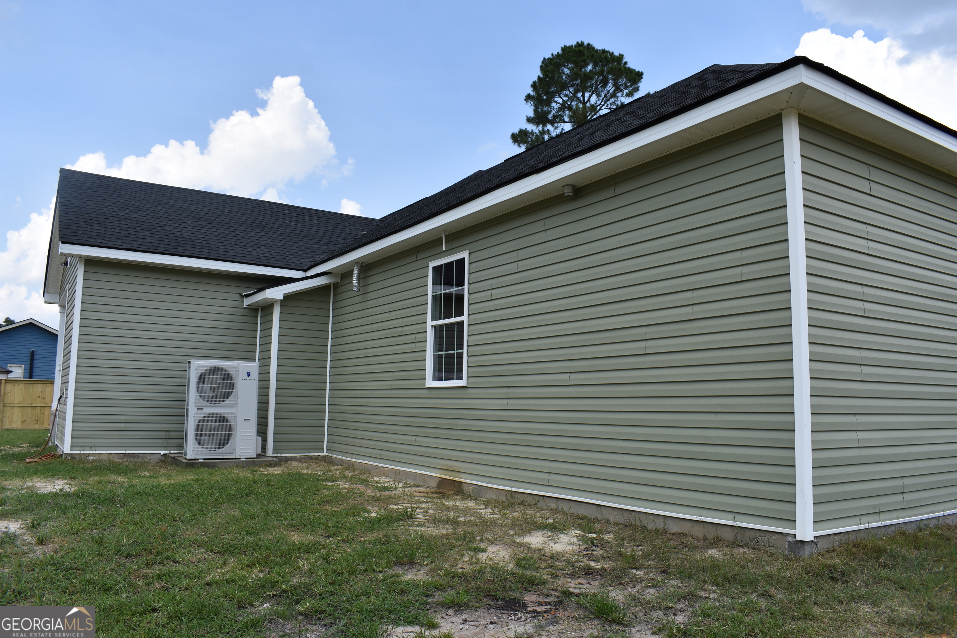537 Quick Run Road Reidsville, GA 30453 - Photo 6 of 42 a front view of a house with a yard