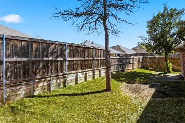 a view of a swimming pool with a backyard