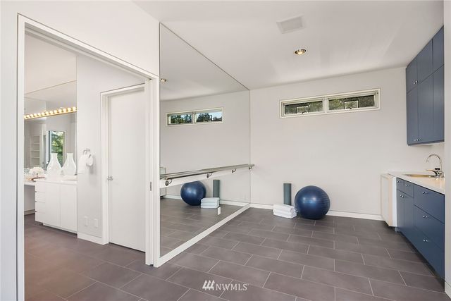 a view of a storage and utility room with a window