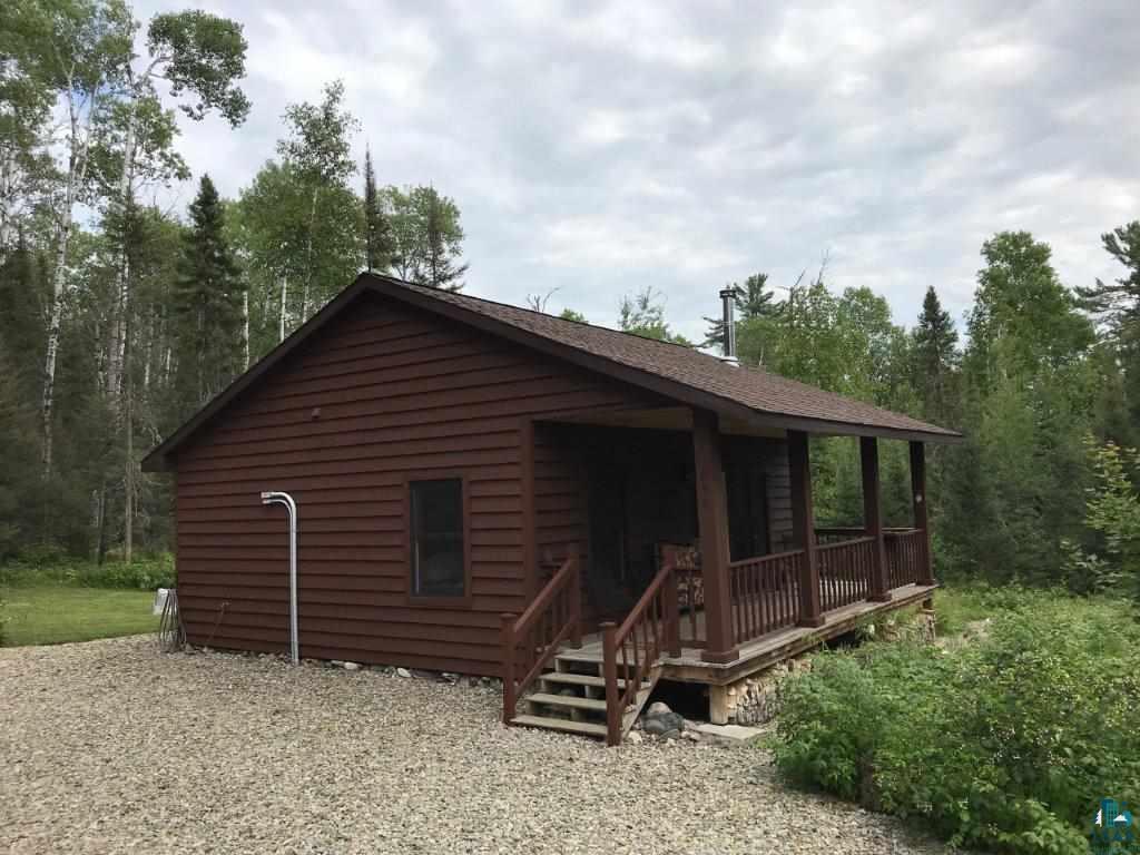 1094 Fernberg Road Ely, MN 55731 - Photo 1 of 12 24 x 28 Wood sided cabin on 8.1 acres.