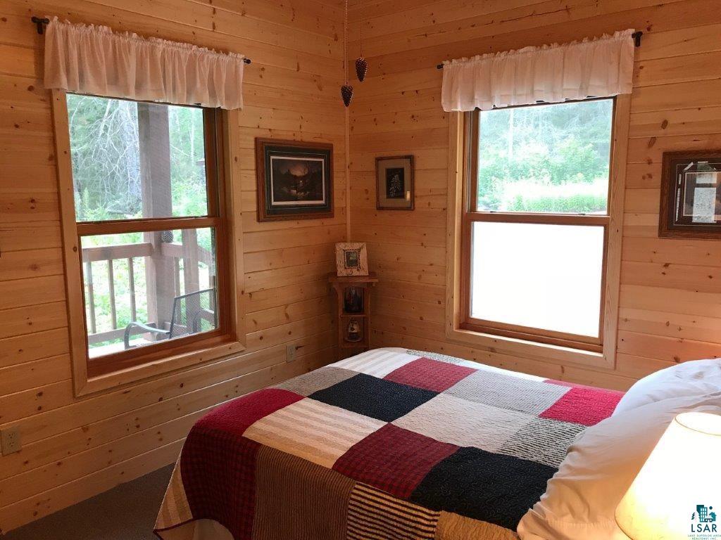 1094 Fernberg Road Ely, MN 55731 - Photo 5 of 12 9 x 11 Carpeted master bedroom.