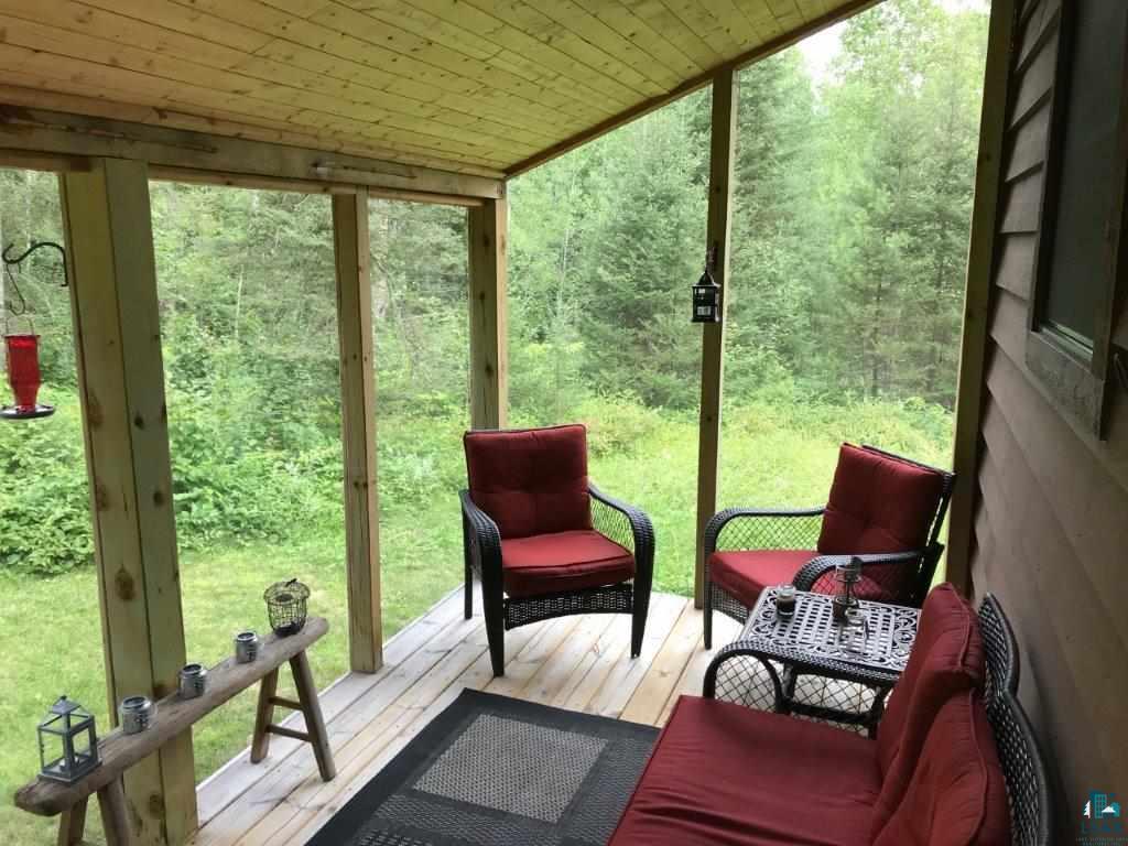 1094 Fernberg Road Ely, MN 55731 - Photo 9 of 12 8 x 16 Screen porch located off of the kitchen.