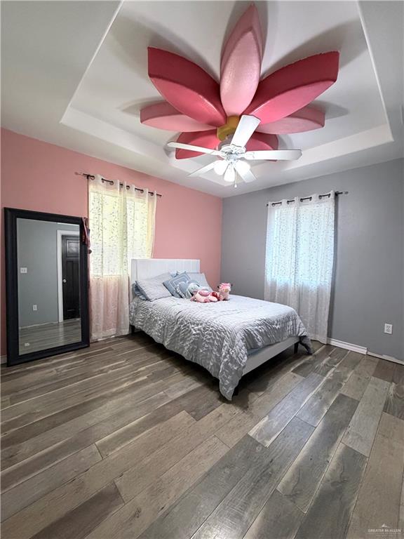 4204 Lott Road Donna, TX 78537 - Photo 13 of 28 Tray ceiling featuring a decorative ceiling fan