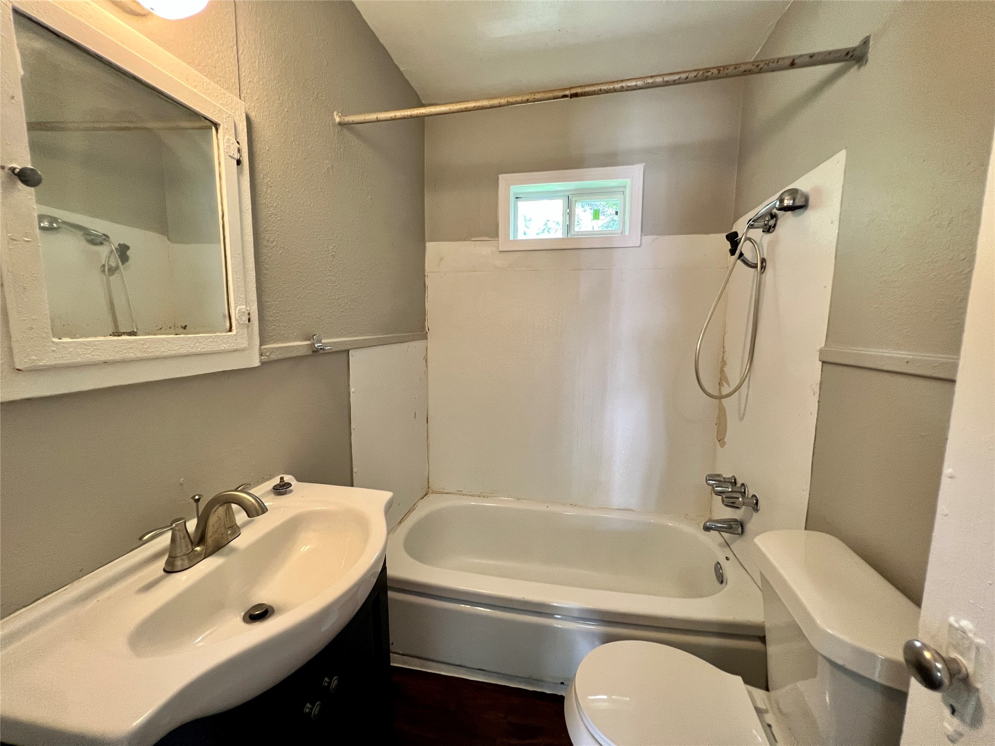 5409 Link Avenue Austin, TX 78751 - Photo 10 of 10 Full bath with vanity, shower / washtub combination, and a textured wall