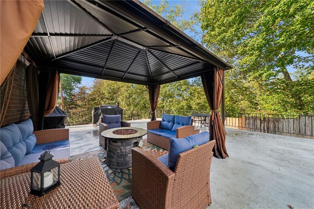 3454 Rigel Street Pittsburgh, PA 15212 - Photo 6 of 37 a view of a patio with a table chairs and a table