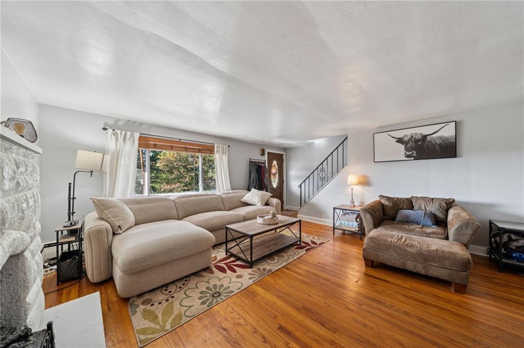 3454 Rigel Street Pittsburgh, PA 15212 - Photo 10 of 37 a living room with furniture and a large window