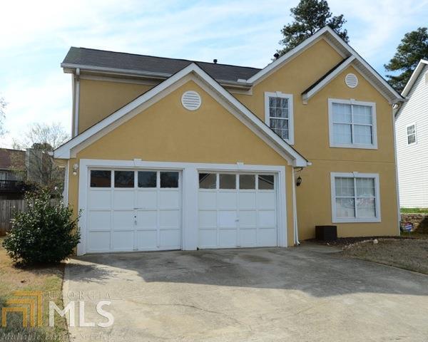 3150 Ozmer Landing Decatur, GA 30034 - Photo 1 of 1 a view of a house with a yard and garage