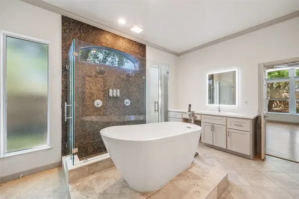 a bathroom with a sink a toilet and bathtub