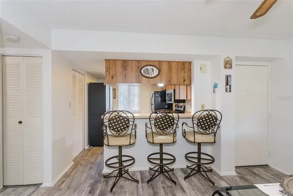a view of a dinning room and chairs in a room