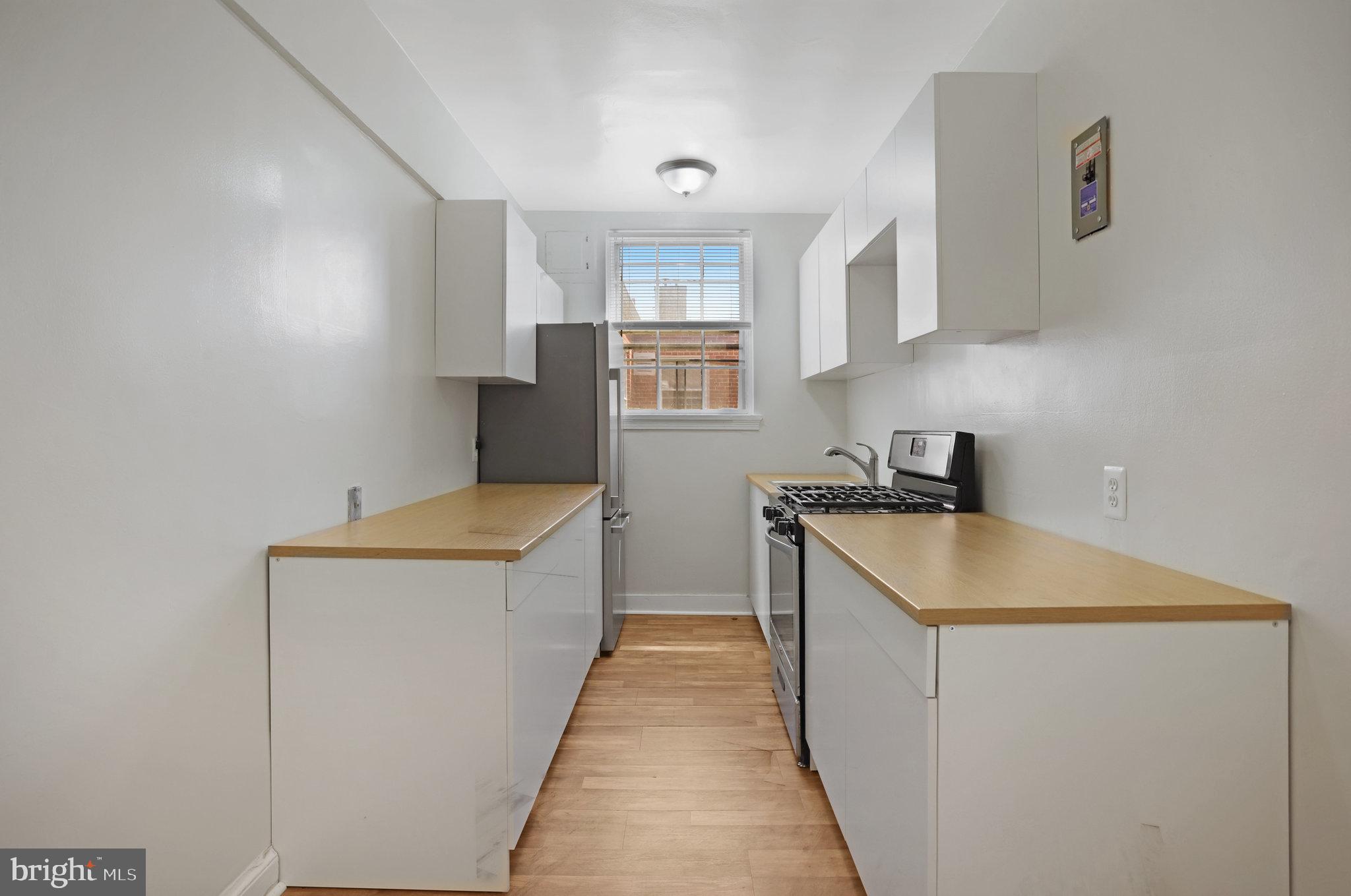 1446 Tuckerman Street Northwest, Unit 306 Washington, DC 20011 - Photo 3 of 26 2025 Cabinets