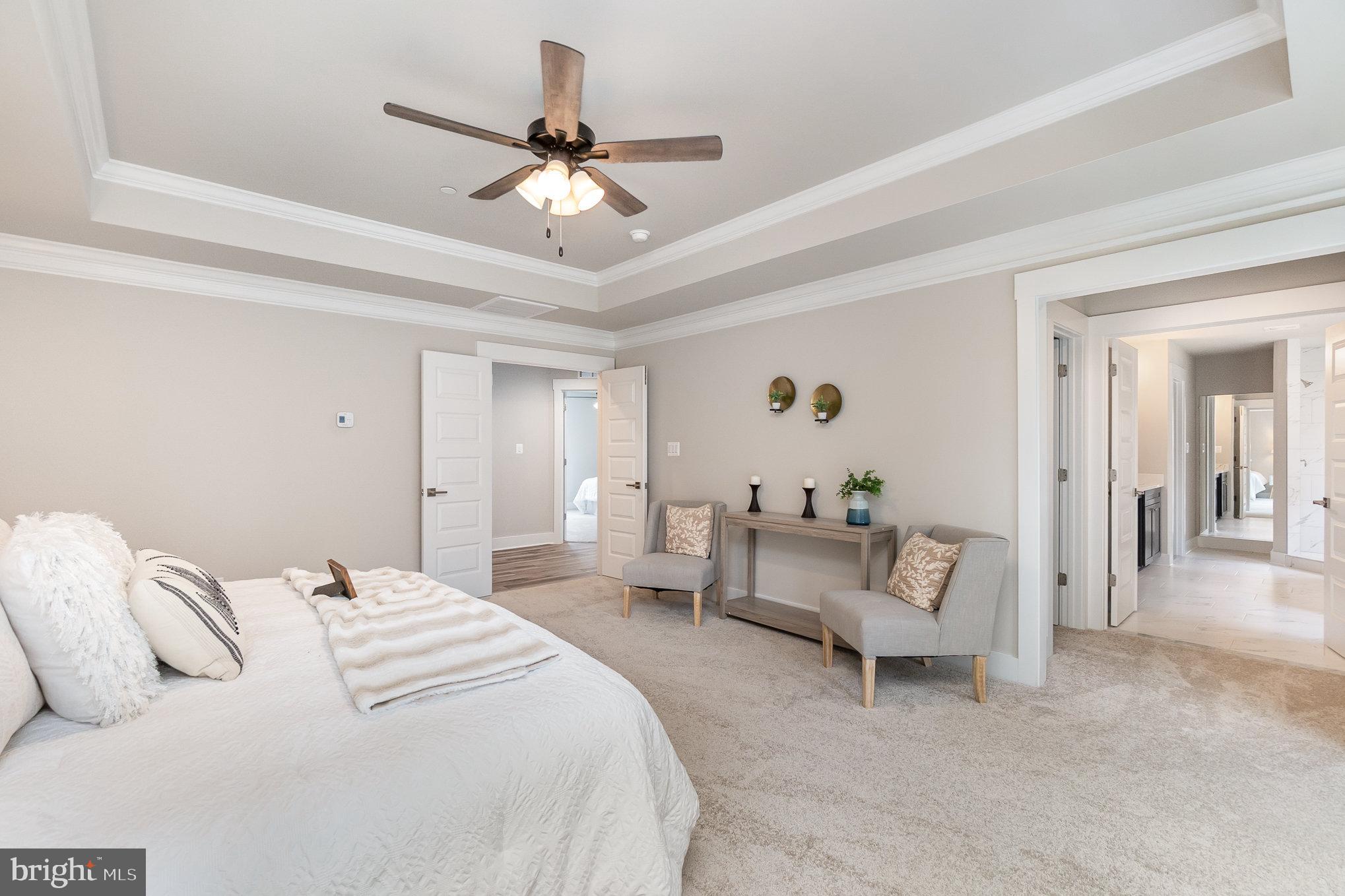 3104 Paper Mill Road Phoenix, MD 21131 - Photo 38 of 77 a bedroom with a bed furniture and a ceiling fan