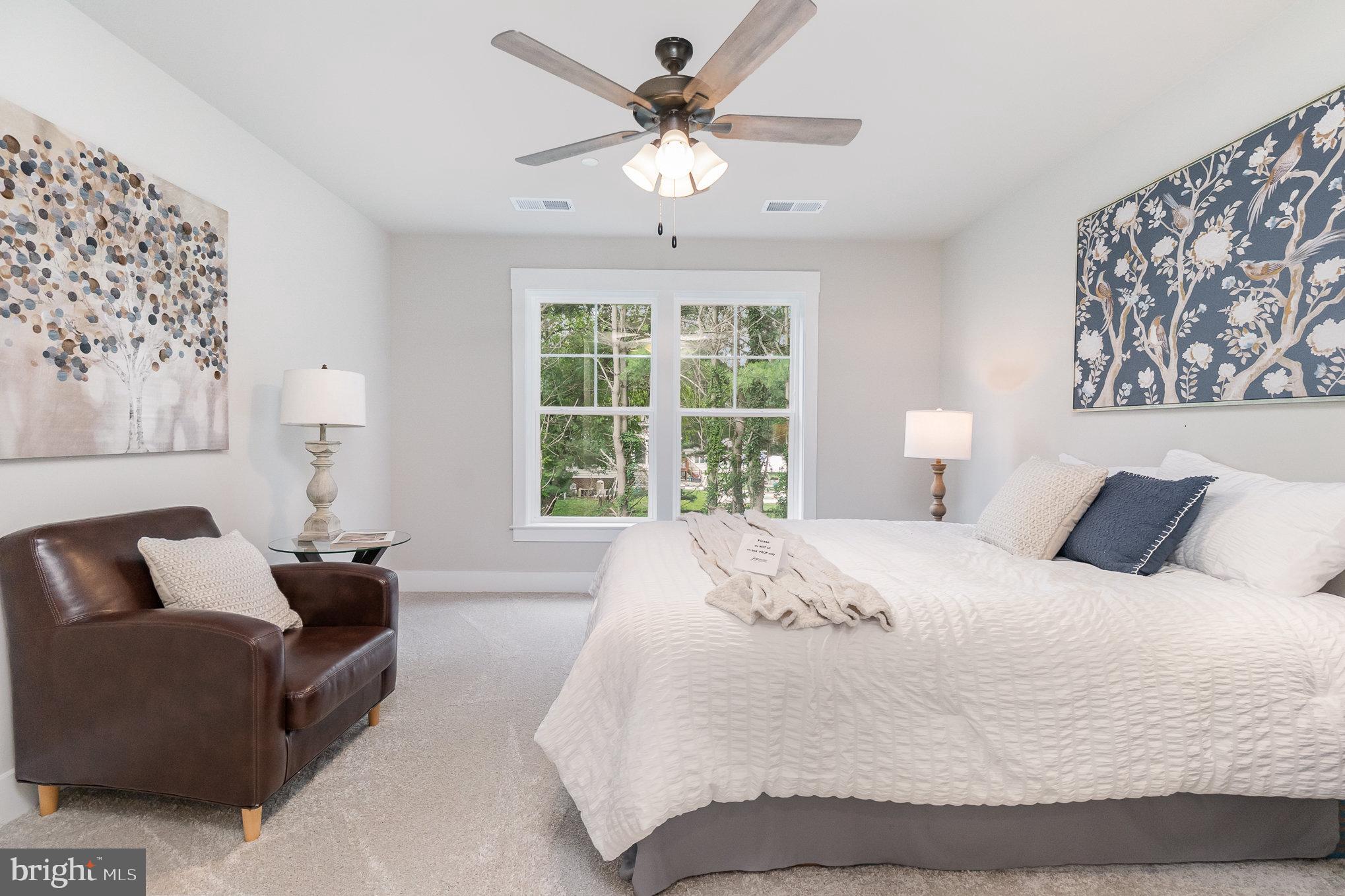 3104 Paper Mill Road Phoenix, MD 21131 - Photo 49 of 77 a bed room with a bed and a couch