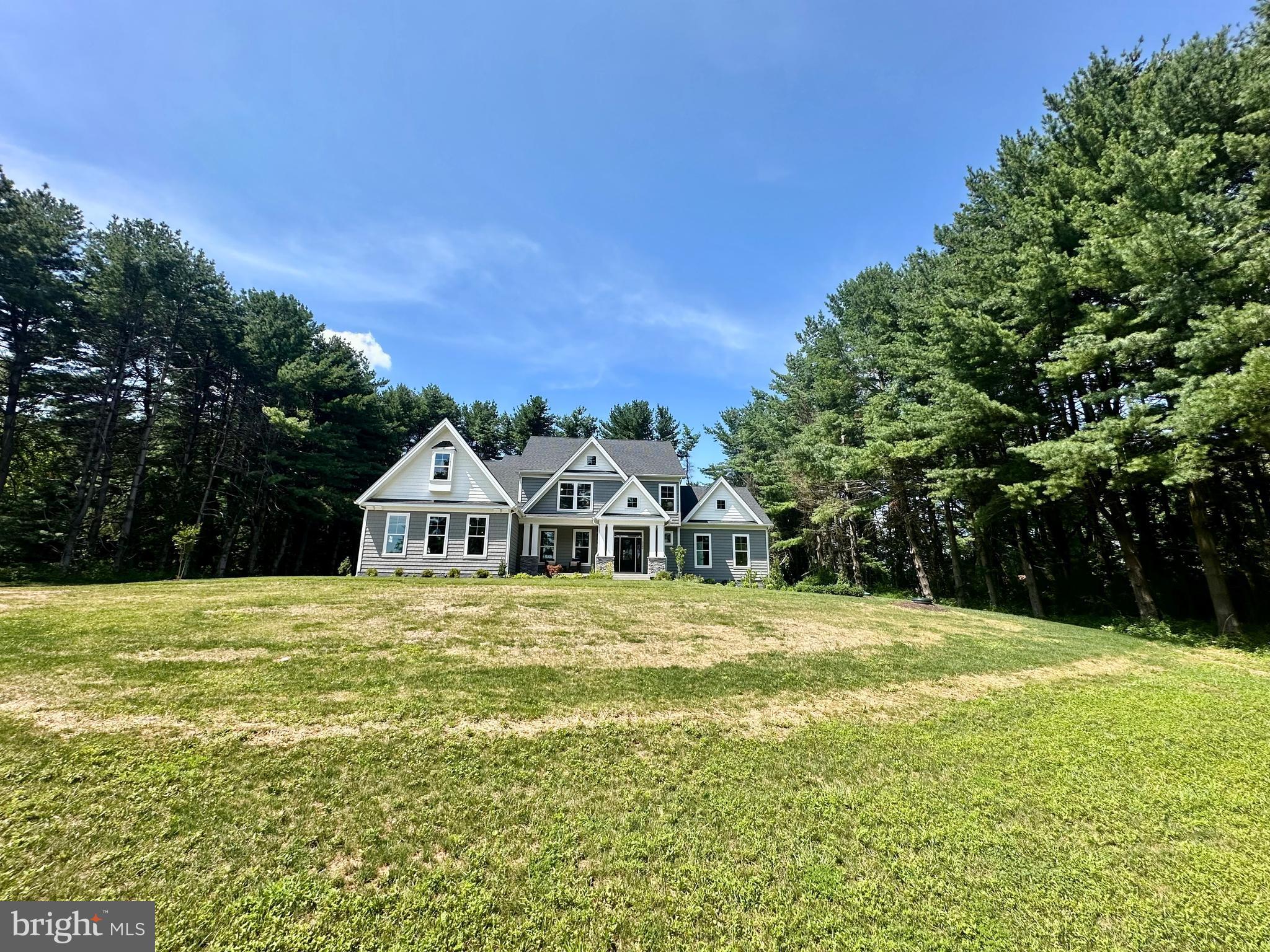 3104 Paper Mill Road Phoenix, MD 21131 - Photo 53 of 77 a front view of a house with a big yard