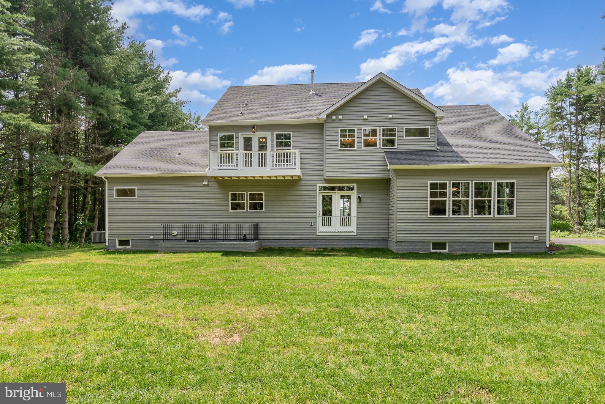 3104 Paper Mill Road Phoenix, MD 21131 - Photo 56 of 77 a front view of a house with a yard
