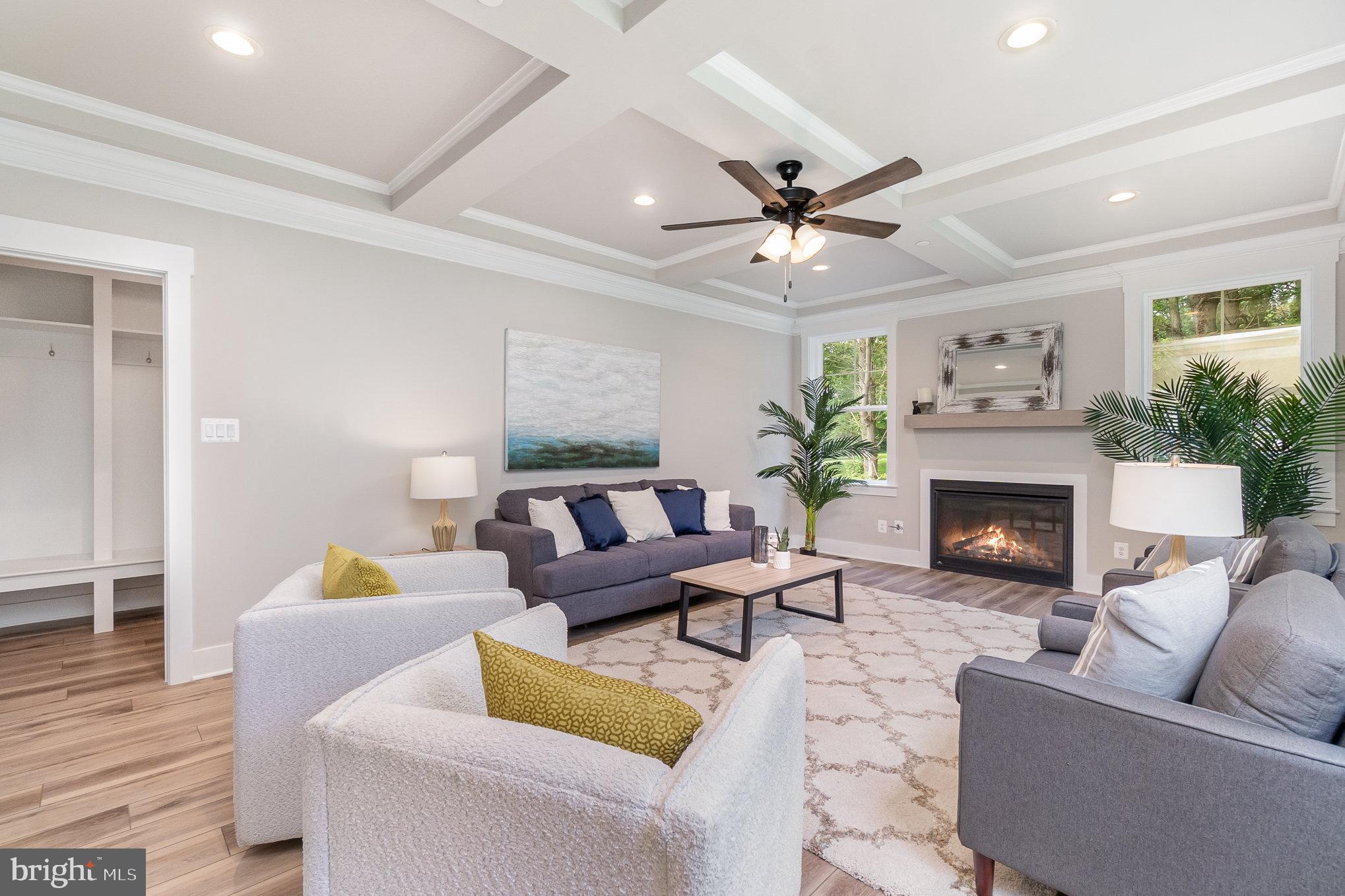 3104 Paper Mill Road Phoenix, MD 21131 - Photo 69 of 77 a living room with furniture and a fireplace