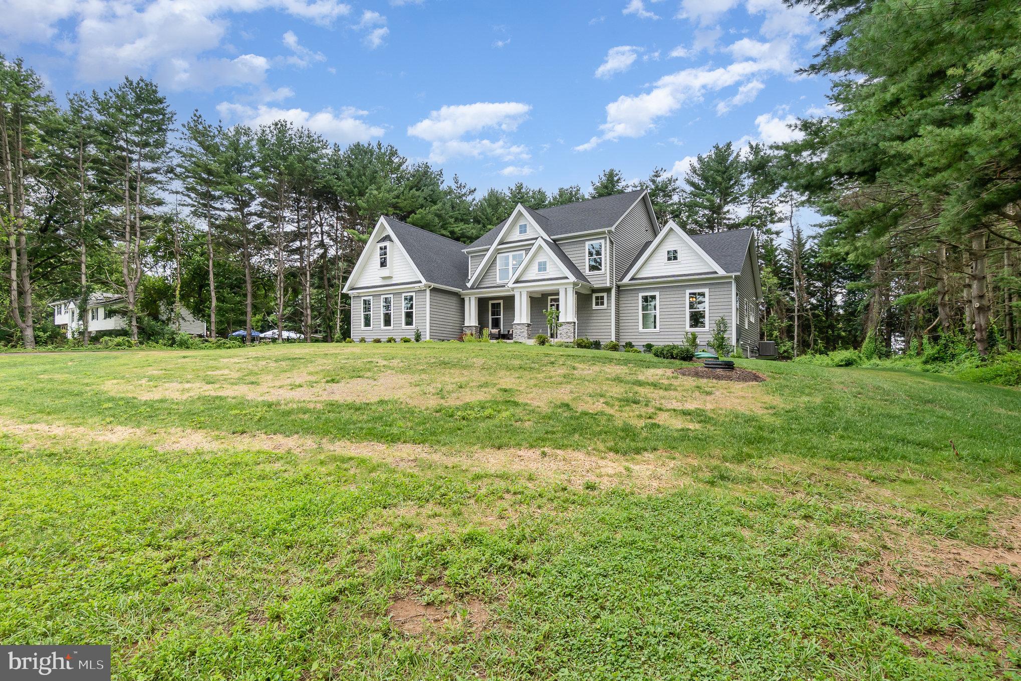 3104 Paper Mill Road Phoenix, MD 21131 - Photo 74 of 77 a front view of a house with a garden