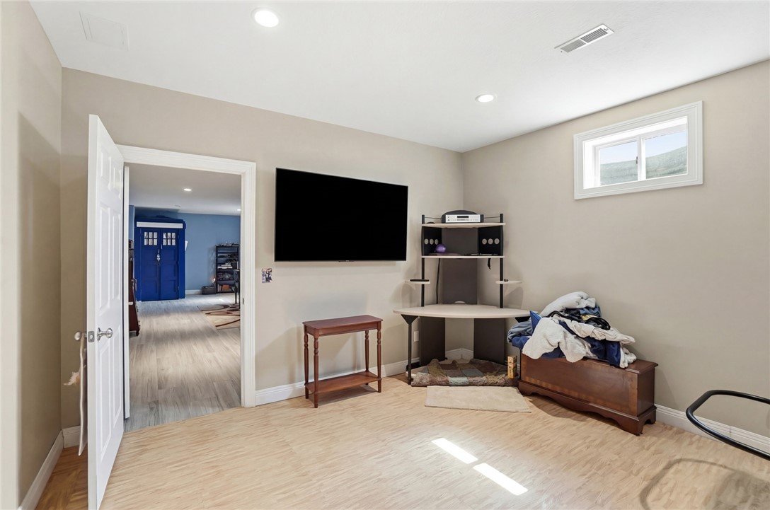 472 Timber Walk Court Springboro, OH 45066 - Photo 46 of 86 The exercise room has a TV and plenty of light