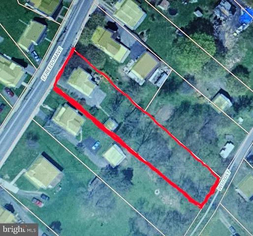 a view of a tennis ground with a wooden floor