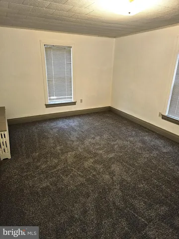 an empty room with a workbench