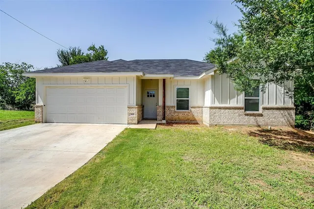 front view of house with a yard