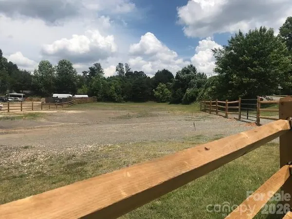 a view of a swimming pool with a yard