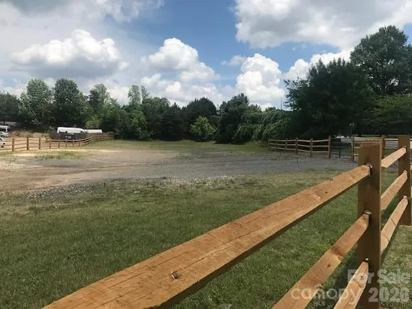 a view of a lake with a yard