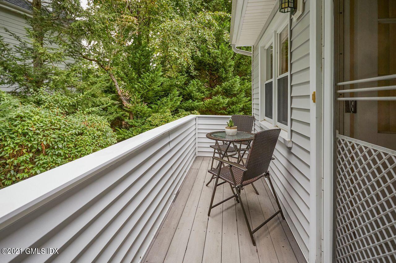 16 Cat Rock Road Cos Cob, CT 06807 - Photo 12 of 26 a view of a balcony with chairs