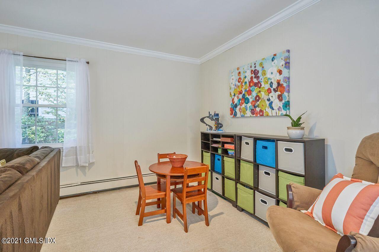 16 Cat Rock Road Cos Cob, CT 06807 - Photo 18 of 26 a view of a dining room with furniture and a window