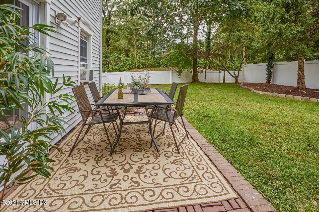 16 Cat Rock Road Cos Cob, CT 06807 - Photo 24 of 26 a view of an outdoor sitting area with furniture