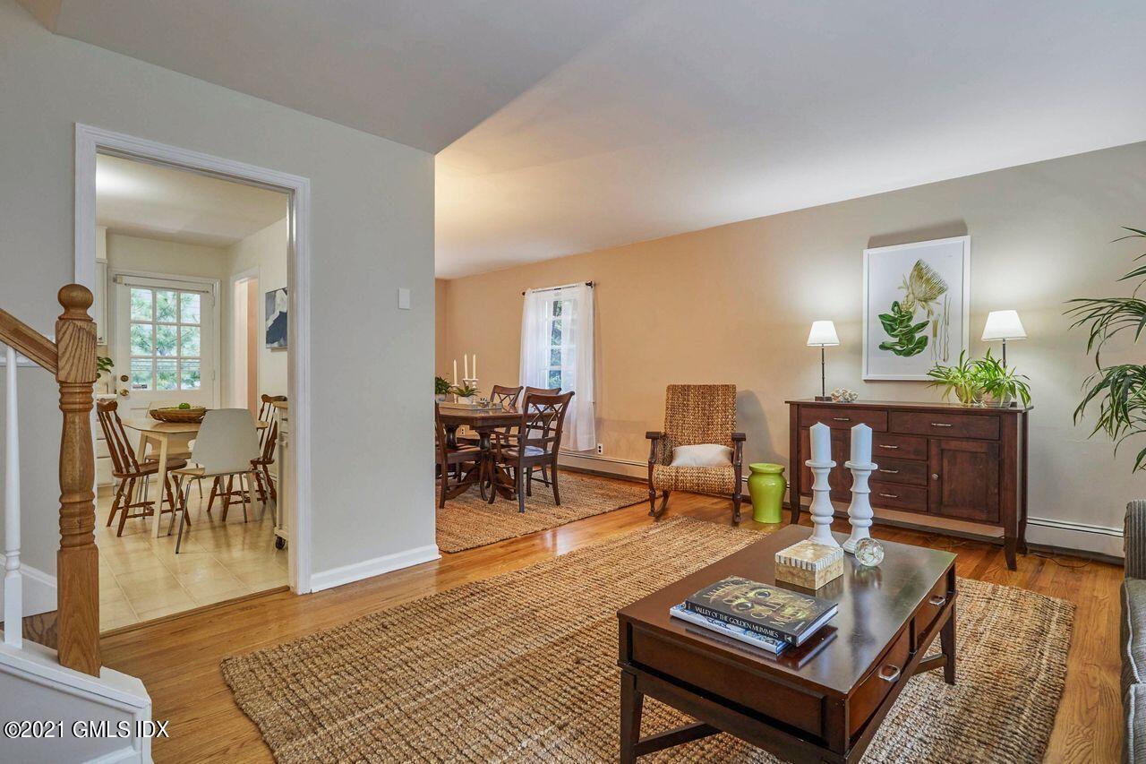 16 Cat Rock Road Cos Cob, CT 06807 - Photo 5 of 26 a living room with furniture and a table