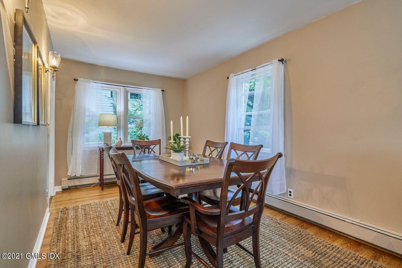 16 Cat Rock Road Cos Cob, CT 06807 - Photo 7 of 26 a view of a dining room with furniture and window