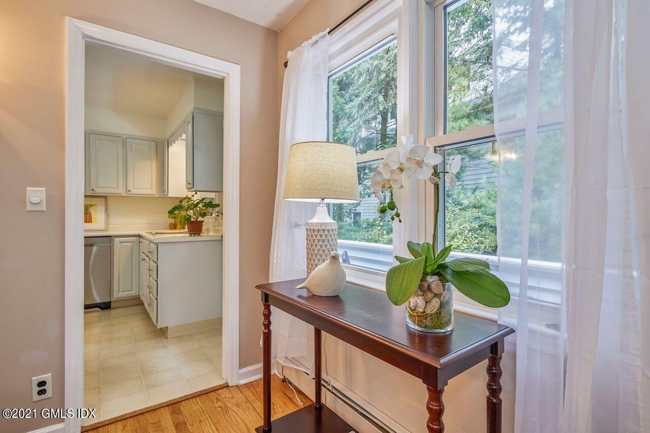 16 Cat Rock Road Cos Cob, CT 06807 - Photo 8 of 26 a living room with furniture and a window