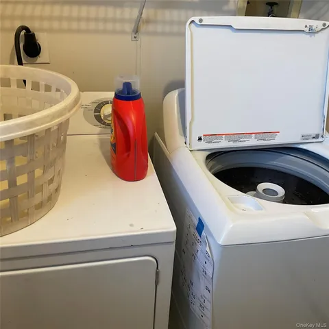 a view of a house with a yard and balcony