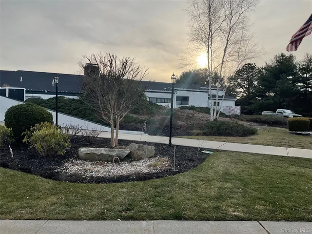 a view of a building with a road