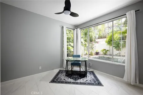 a living room with a rug